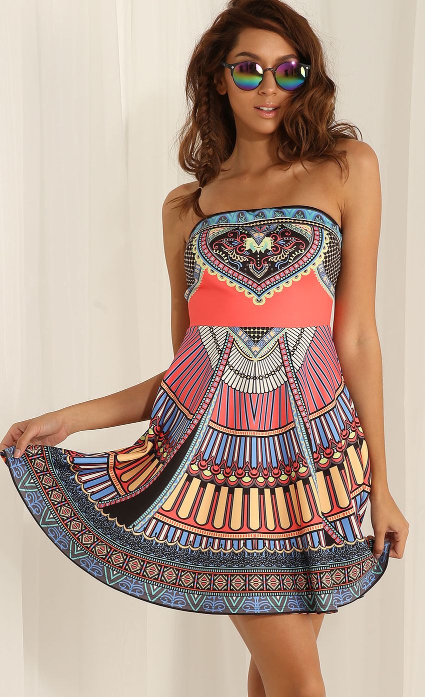 Picture Party dress with geometric print. Source: https://media-img.lucyinthesky.com/data/Apr15_1/850xAUTO/0Y5A3357F.JPG