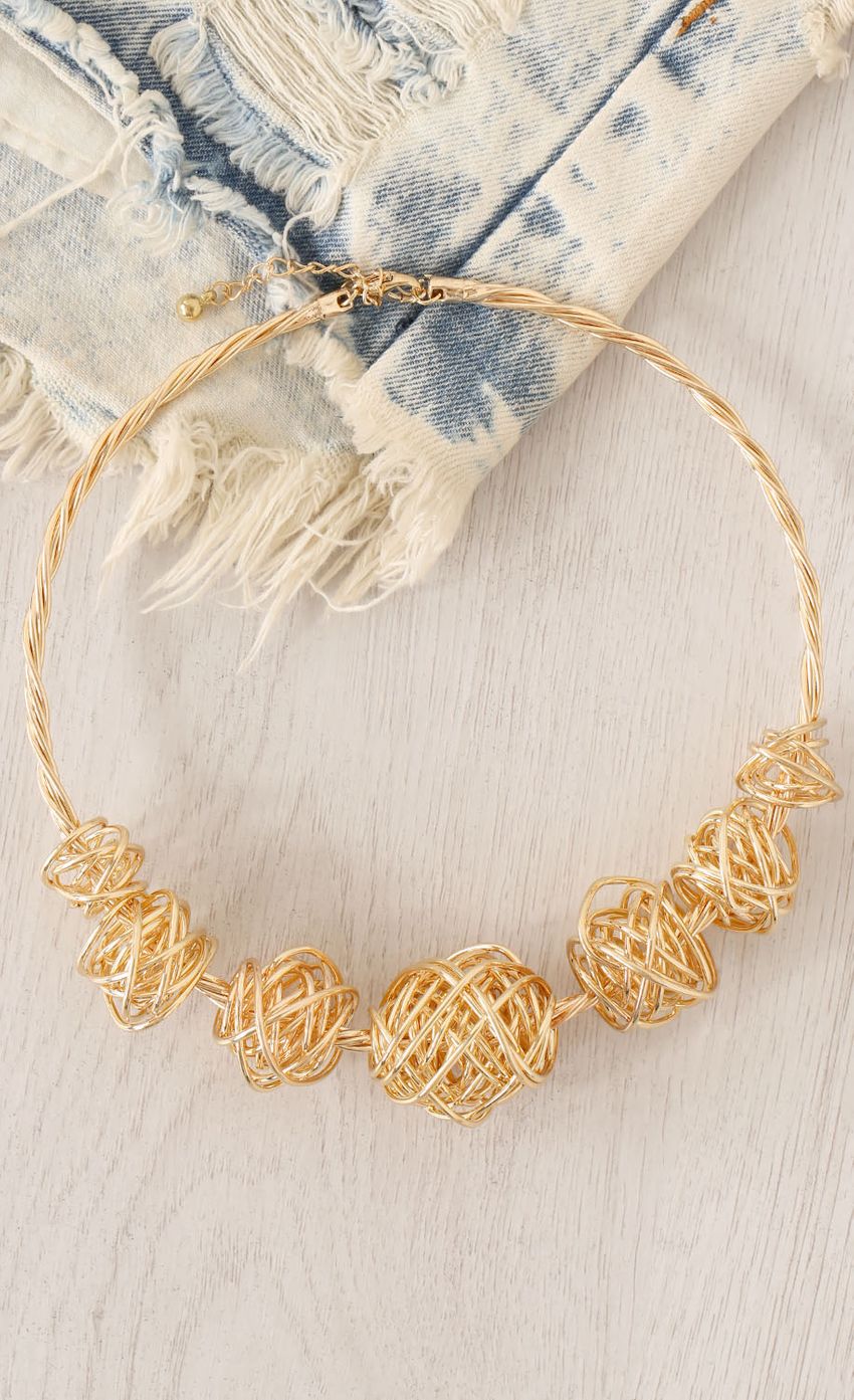 Picture Gold Twine Charm Choker Necklace. Source: https://media-img.lucyinthesky.com/data/Apr15_1/850xAUTO/0Y5A62301.JPG