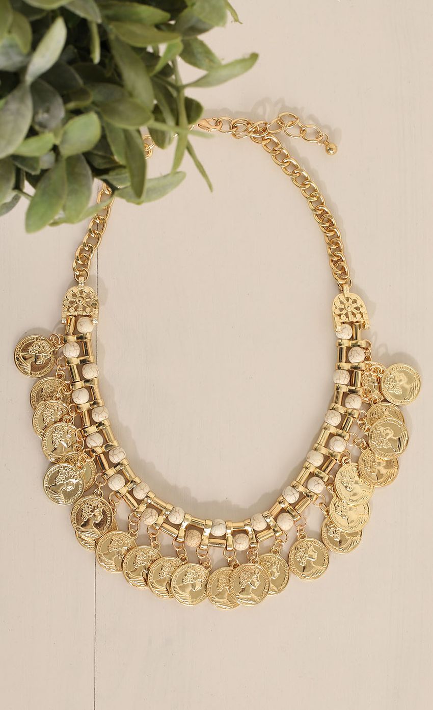 Picture Gold Coin Bib Necklace. Source: https://media-img.lucyinthesky.com/data/Apr15_2/850xAUTO/0Y5A6715.JPG