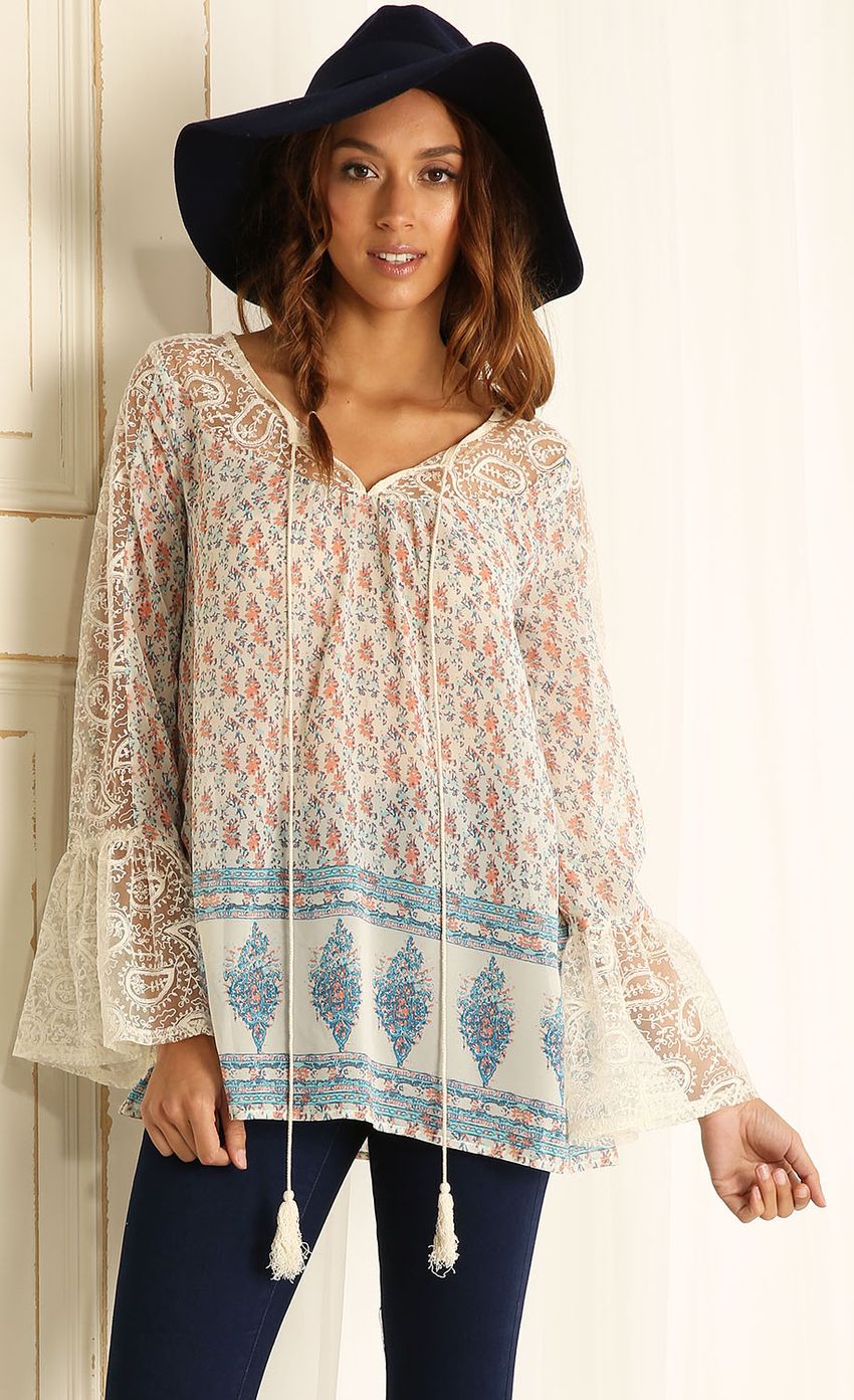 Picture Lace Long Sleeved Top With Tassels. Source: https://media-img.lucyinthesky.com/data/Apr15_2/850xAUTO/0Y5A8943.JPG