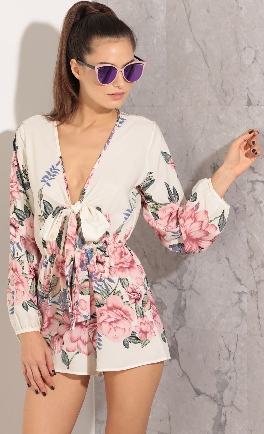 Picture Plunge Floral Print Romper In Cream. Source: https://media-img.lucyinthesky.com/data/Apr16_1/850xAUTO/0Y5A0212.JPG