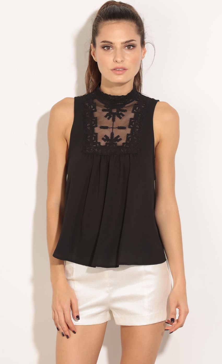 Picture Embellished High Neck Top In Black. Source: https://media-img.lucyinthesky.com/data/Apr16_1/850xAUTO/0Y5A1629.JPG