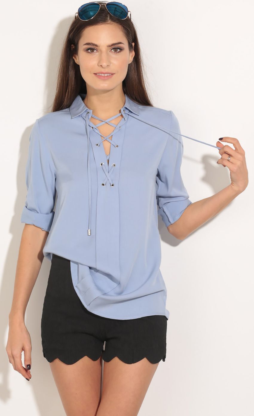 Picture Lace-Up Chiffon Top In Powder Blue. Source: https://media-img.lucyinthesky.com/data/Apr16_1/850xAUTO/0Y5A3452.JPG