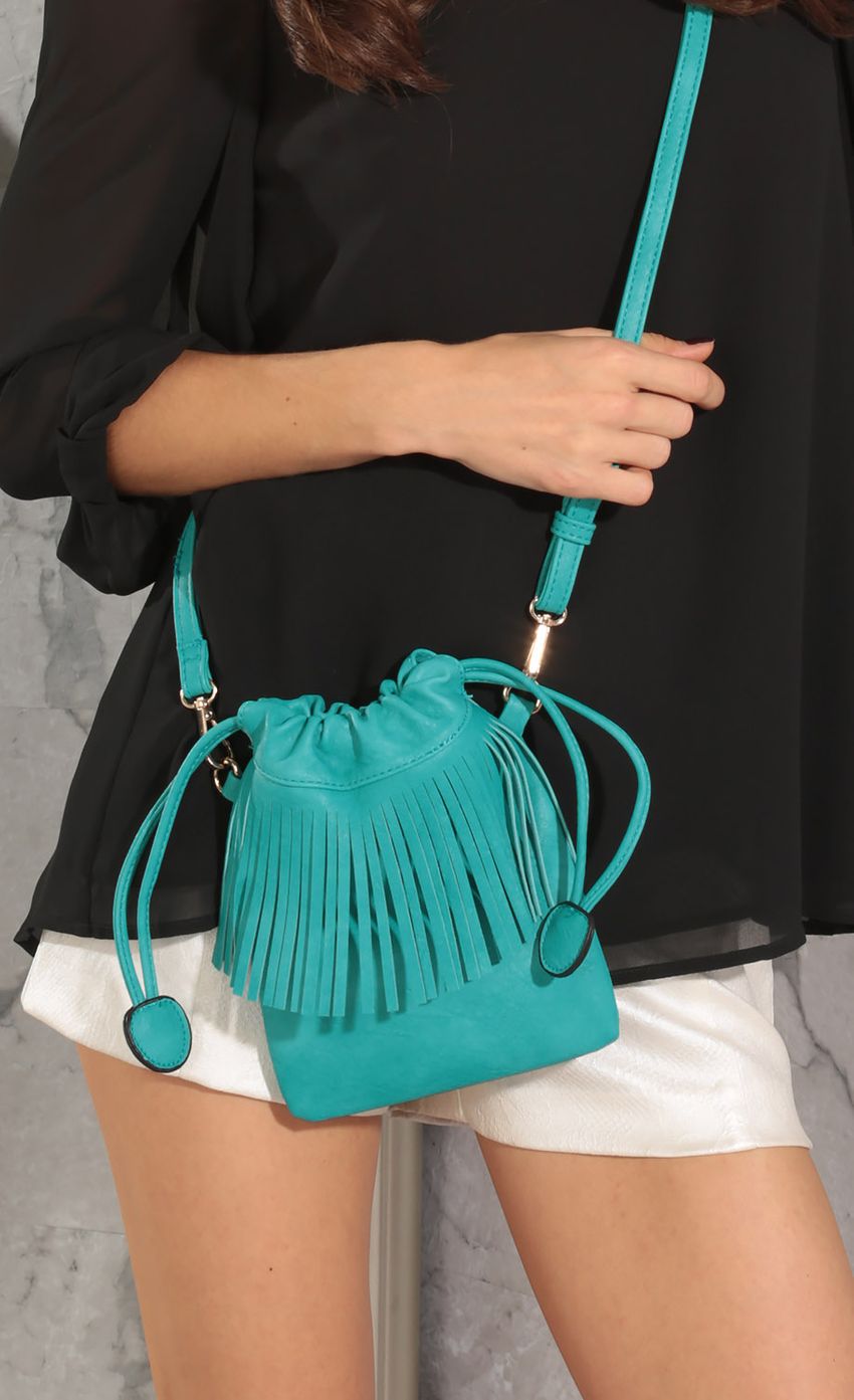 Picture Fringe Crossbody Tote In Teal. Source: https://media-img.lucyinthesky.com/data/Apr16_1/850xAUTO/0Y5A6213.JPG