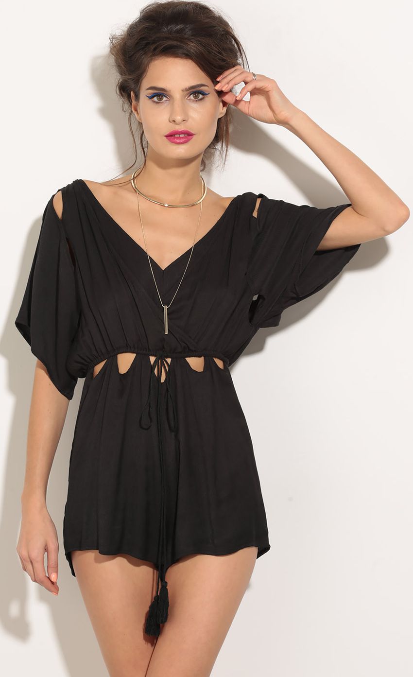 Picture Peek-A-Boo Tassel Romper In Charcoal. Source: https://media-img.lucyinthesky.com/data/Apr16_2/850xAUTO/0Y5A1037.JPG