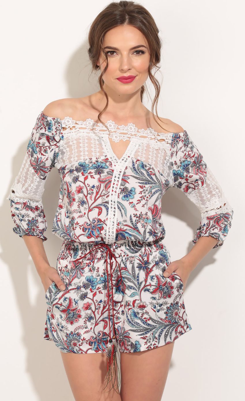 Picture Floral Print Romper In White. Source: https://media-img.lucyinthesky.com/data/Apr16_2/850xAUTO/0Y5A3891.JPG