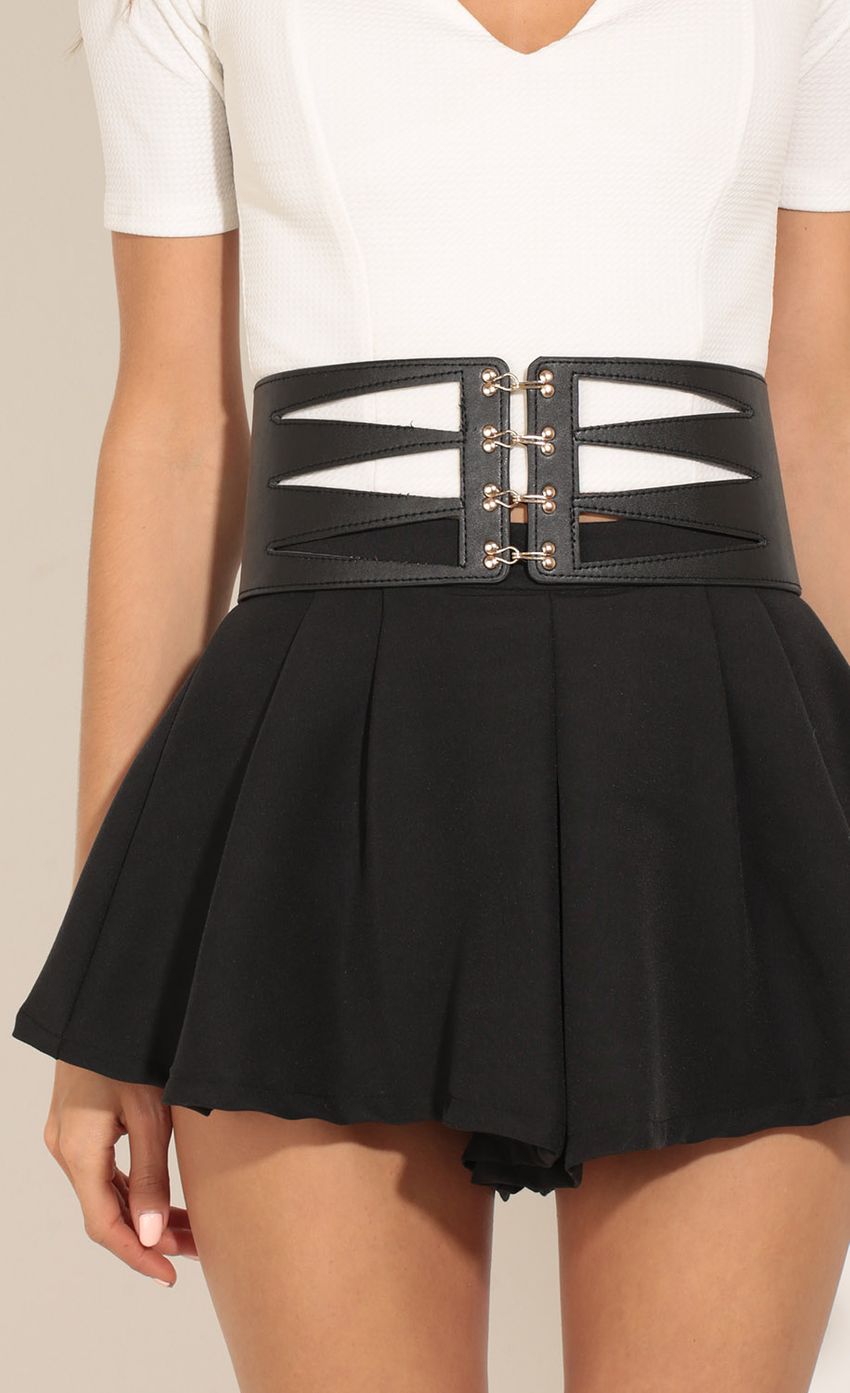 Picture Caged Cut-Out Faux Leather Waist Belt. Source: https://media-img.lucyinthesky.com/data/Apr17_1/850xAUTO/0Y5A8425.JPG