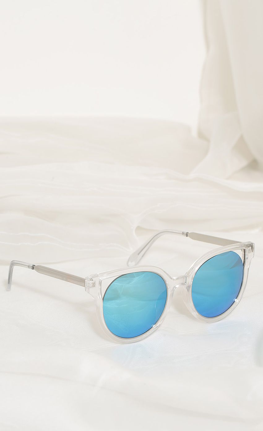 Picture Crystal Clear Cat-Eye Sunglasses In Blue. Source: https://media-img.lucyinthesky.com/data/Apr17_2/850xAUTO/0Y5A5413.JPG
