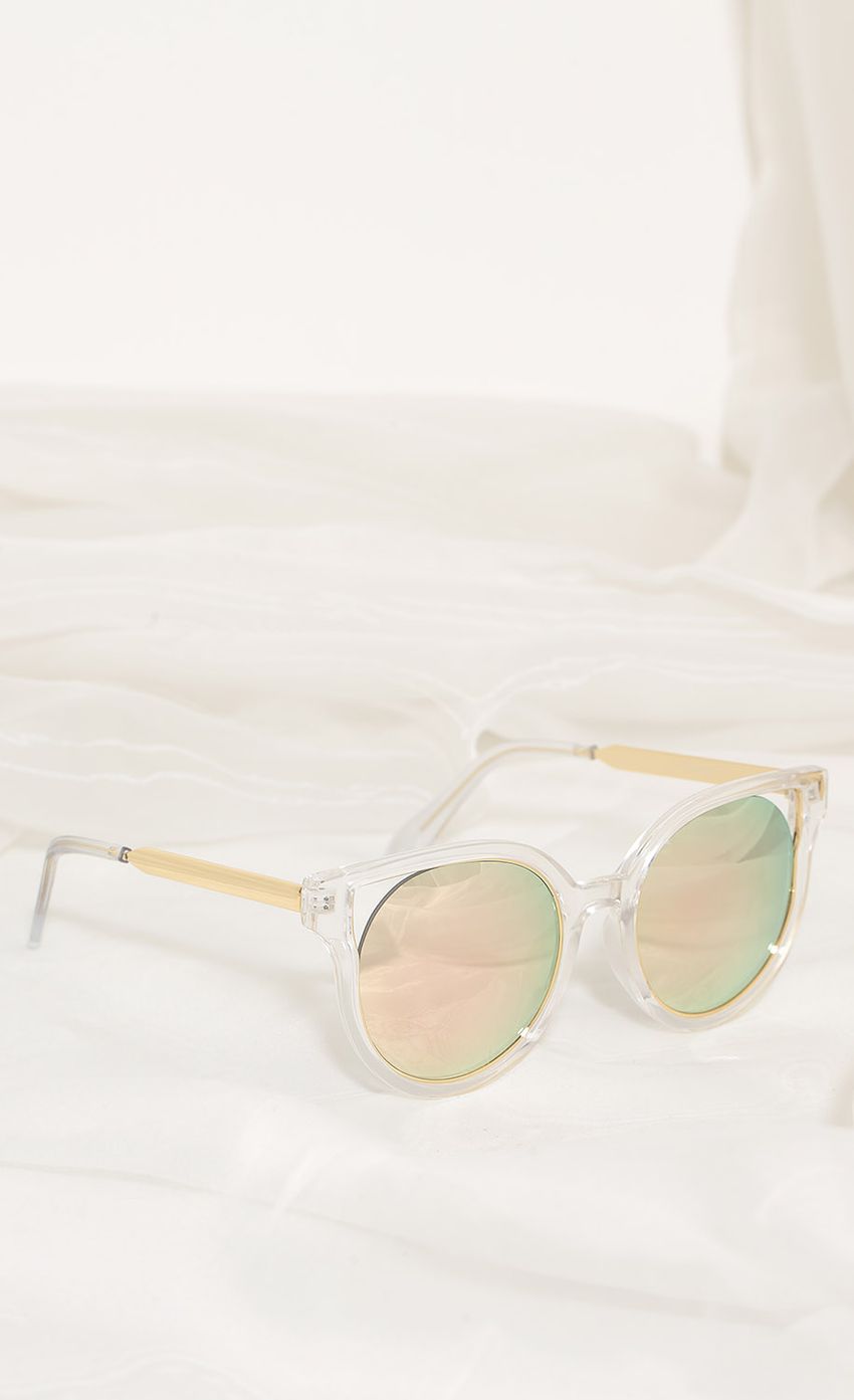 Picture Crystal Clear Cat-Eye Sunglasses In Sunrise. Source: https://media-img.lucyinthesky.com/data/Apr17_2/850xAUTO/0Y5A5438.JPG