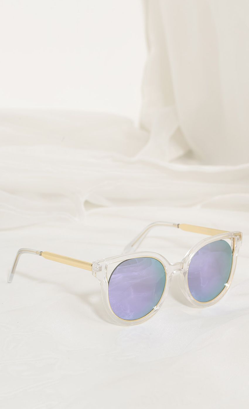 Picture Crystal Clear Cat-Eye Sunglasses In Purple. Source: https://media-img.lucyinthesky.com/data/Apr17_2/850xAUTO/0Y5A5459.JPG