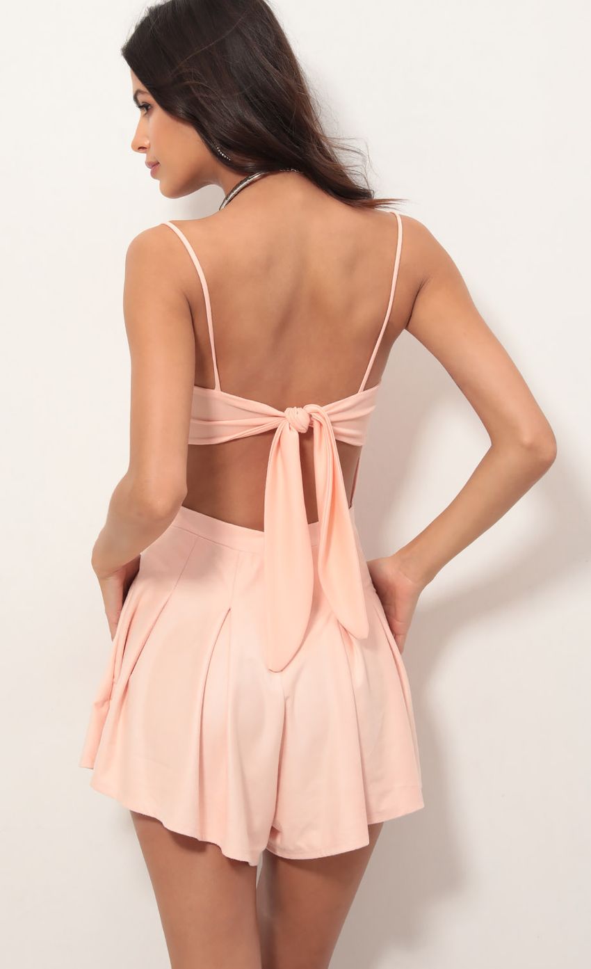 Picture Bella Suede Romper In Peach Parfait. Source: https://media-img.lucyinthesky.com/data/Apr19_1/850xAUTO/781A8489.JPG