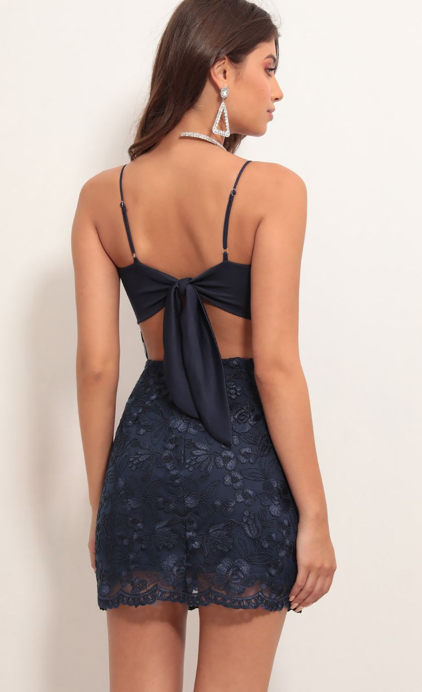 Picture Moira Floral Embroidered Dress in Navy. Source: https://media-img.lucyinthesky.com/data/Apr19_2/850xAUTO/781A4385.JPG