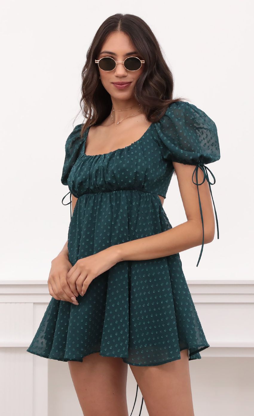 Picture Leilani Dotted Chiffon Baby Doll Dress in Hunter Green. Source: https://media-img.lucyinthesky.com/data/Apr21_1/850xAUTO/1V9A2369.JPG