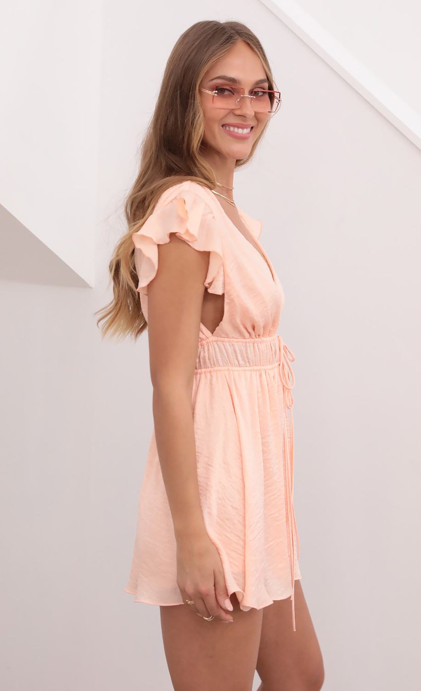 Picture Washed Satin Plunge A-line Dress in Coral. Source: https://media-img.lucyinthesky.com/data/Apr21_1/850xAUTO/1V9A6134.JPG