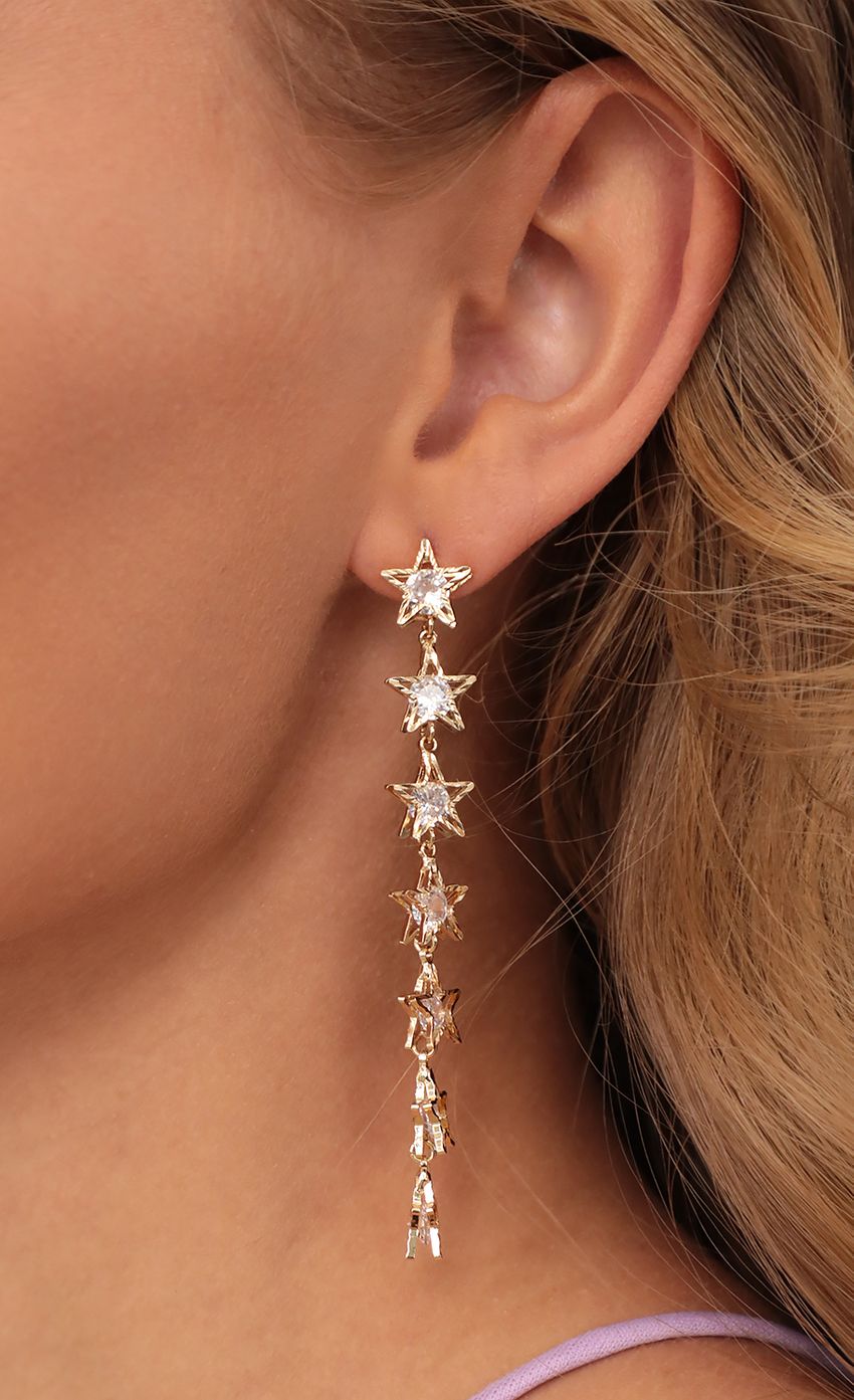 Picture Star Cascade Earrings in Gold. Source: https://media-img.lucyinthesky.com/data/Apr21_1/850xAUTO/AT2A00891.JPG