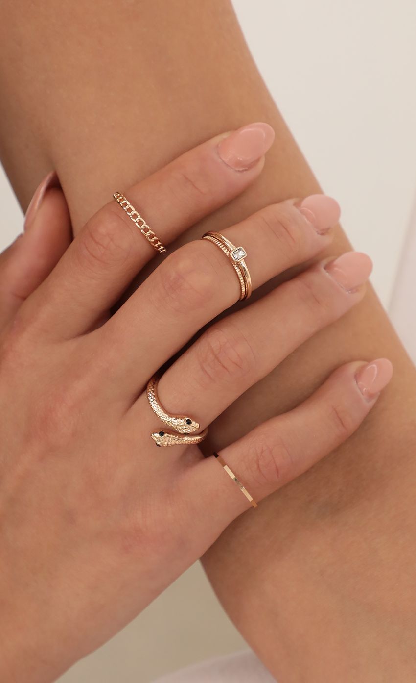 Picture Snake Ring Set in Gold. Source: https://media-img.lucyinthesky.com/data/Apr21_1/850xAUTO/AT2A0278.JPG