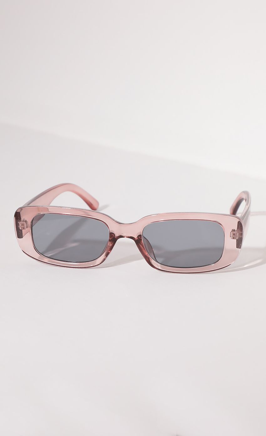 Picture Beverly Rectangular Retro Sunglasses in Clear Pink. Source: https://media-img.lucyinthesky.com/data/Apr21_1/850xAUTO/AT2A0902.JPG