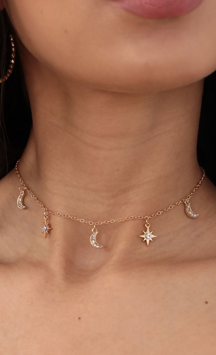 Picture Star and Moon Charm Choker Set. Source: https://media-img.lucyinthesky.com/data/Apr21_1/850xAUTO/AT2A2423.JPG