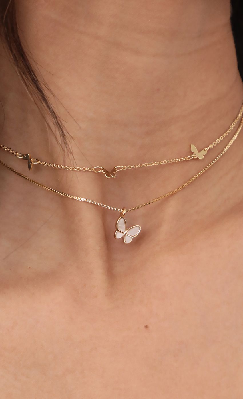 Picture Double Layered Multi Butterfly Necklace Set. Source: https://media-img.lucyinthesky.com/data/Apr21_1/850xAUTO/AT2A4966_COPY.JPG