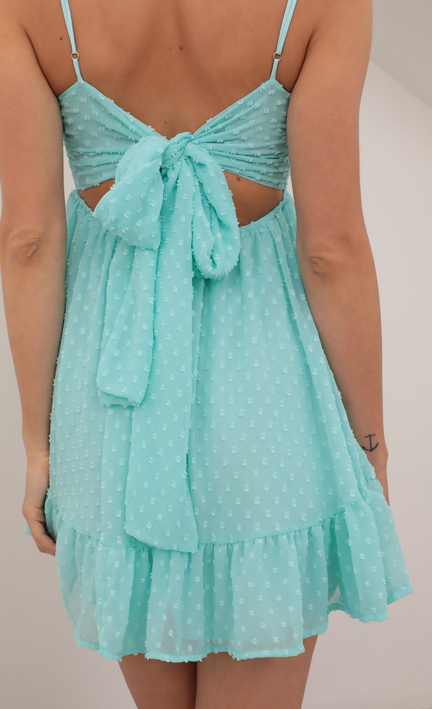 Picture Twist Front Baby Doll in Dotted Turquoise. Source: https://media-img.lucyinthesky.com/data/Apr21_1/850xAUTO/AT2A6864.JPG