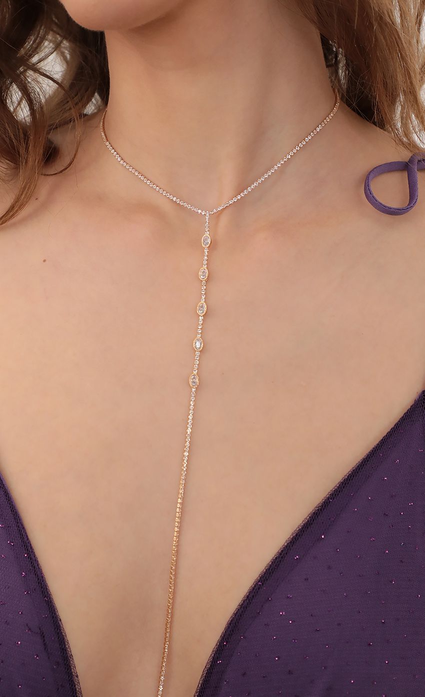Picture Crystal Lariat Necklace in Gold. Source: https://media-img.lucyinthesky.com/data/Apr21_1/850xAUTO/AT2A8613.JPG