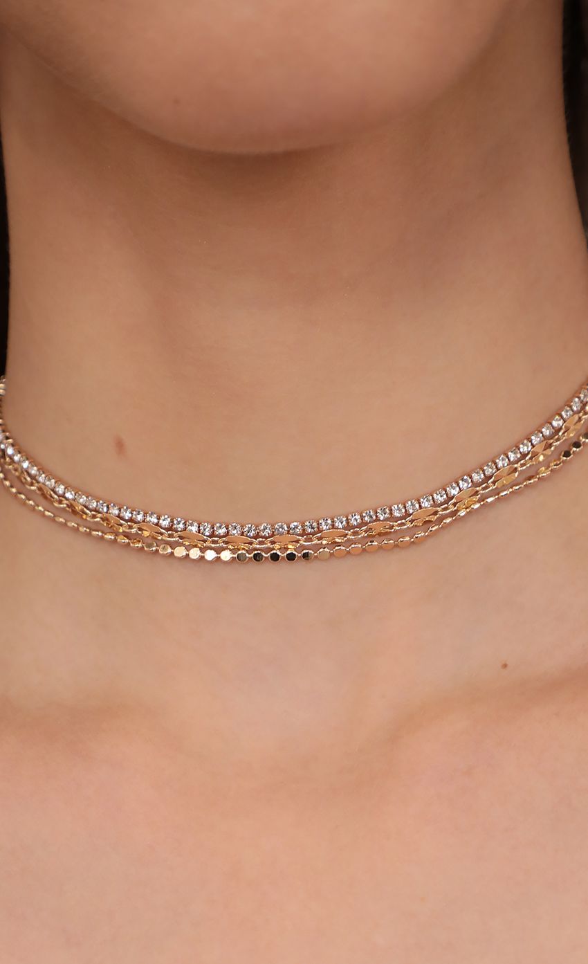 Picture Three Layer Choker Set in Gold. Source: https://media-img.lucyinthesky.com/data/Apr21_1/850xAUTO/AT2A9391.JPG