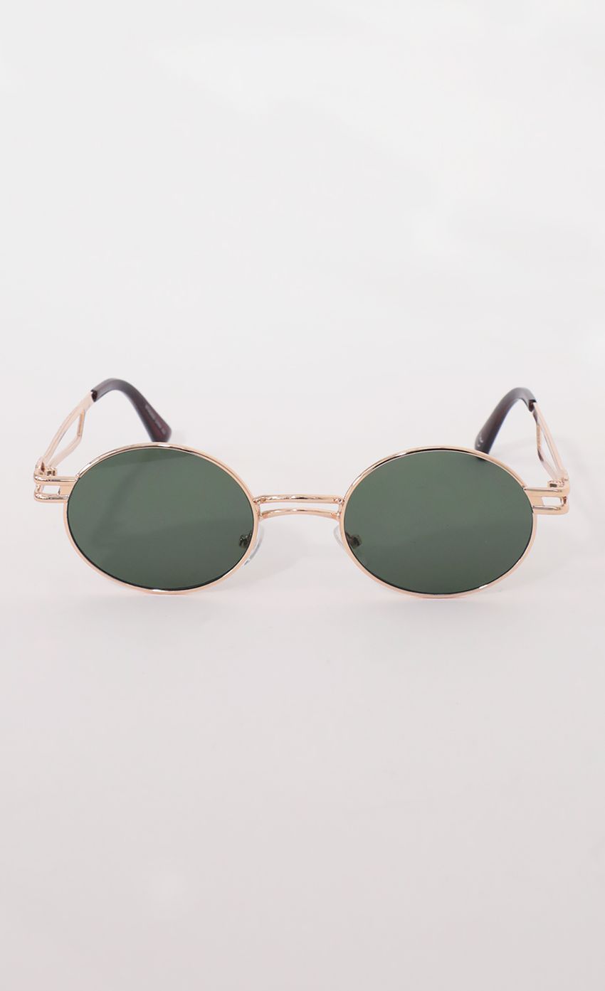 Picture Metal Double Temple Accent Oval Round Gold Sunglasses in Green. Source: https://media-img.lucyinthesky.com/data/Apr21_1/850xAUTO/AT2A9518.JPG