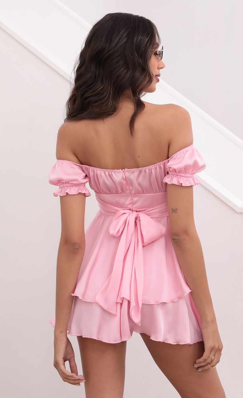 Picture Ruched Wrap Tie Romper in Satin Pink. Source: https://media-img.lucyinthesky.com/data/Apr21_2/850xAUTO/1V9A0090.JPG