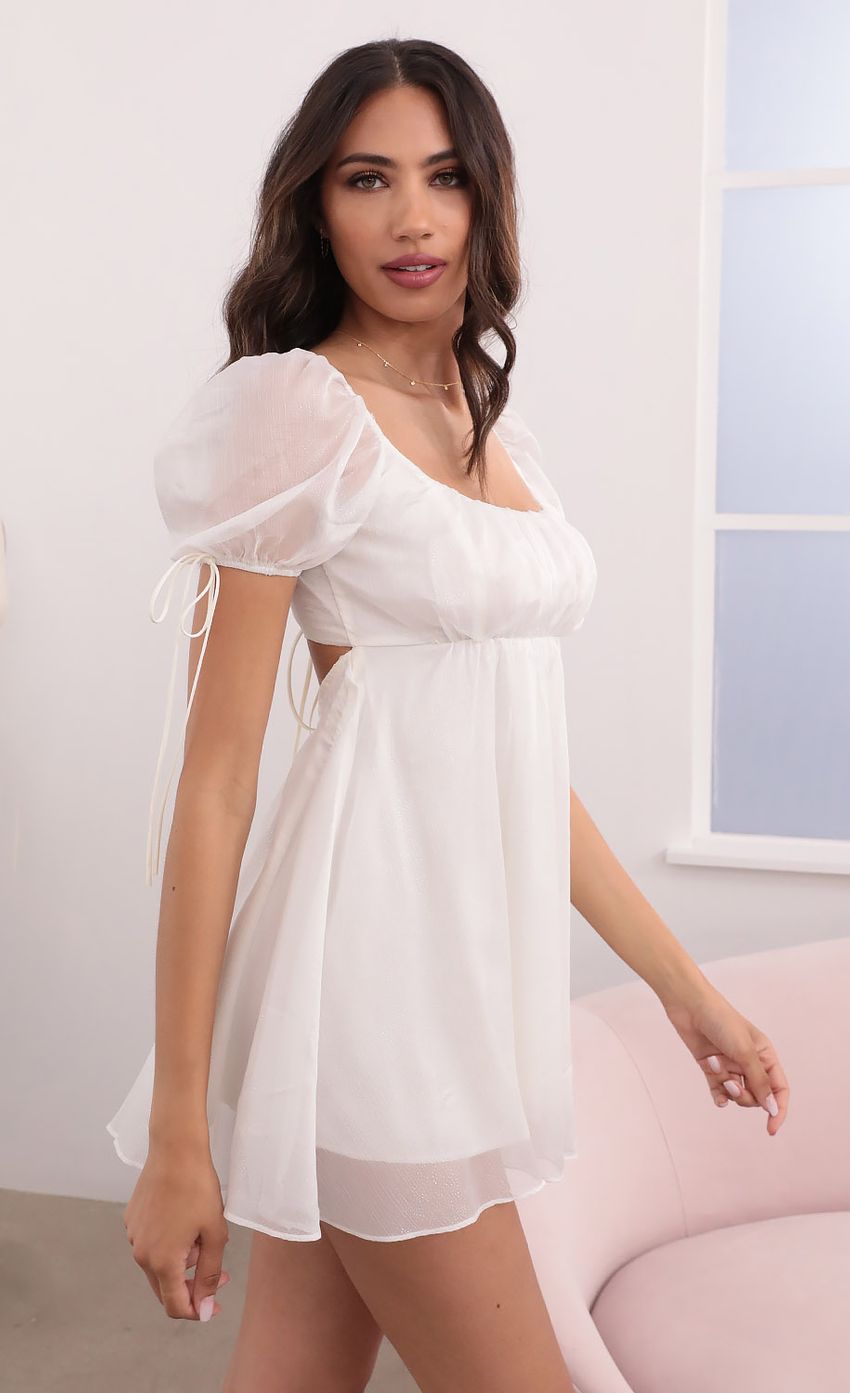Picture Chiffon Shimmer Baby Doll Dress in White. Source: https://media-img.lucyinthesky.com/data/Apr21_2/850xAUTO/1V9A2389.JPG