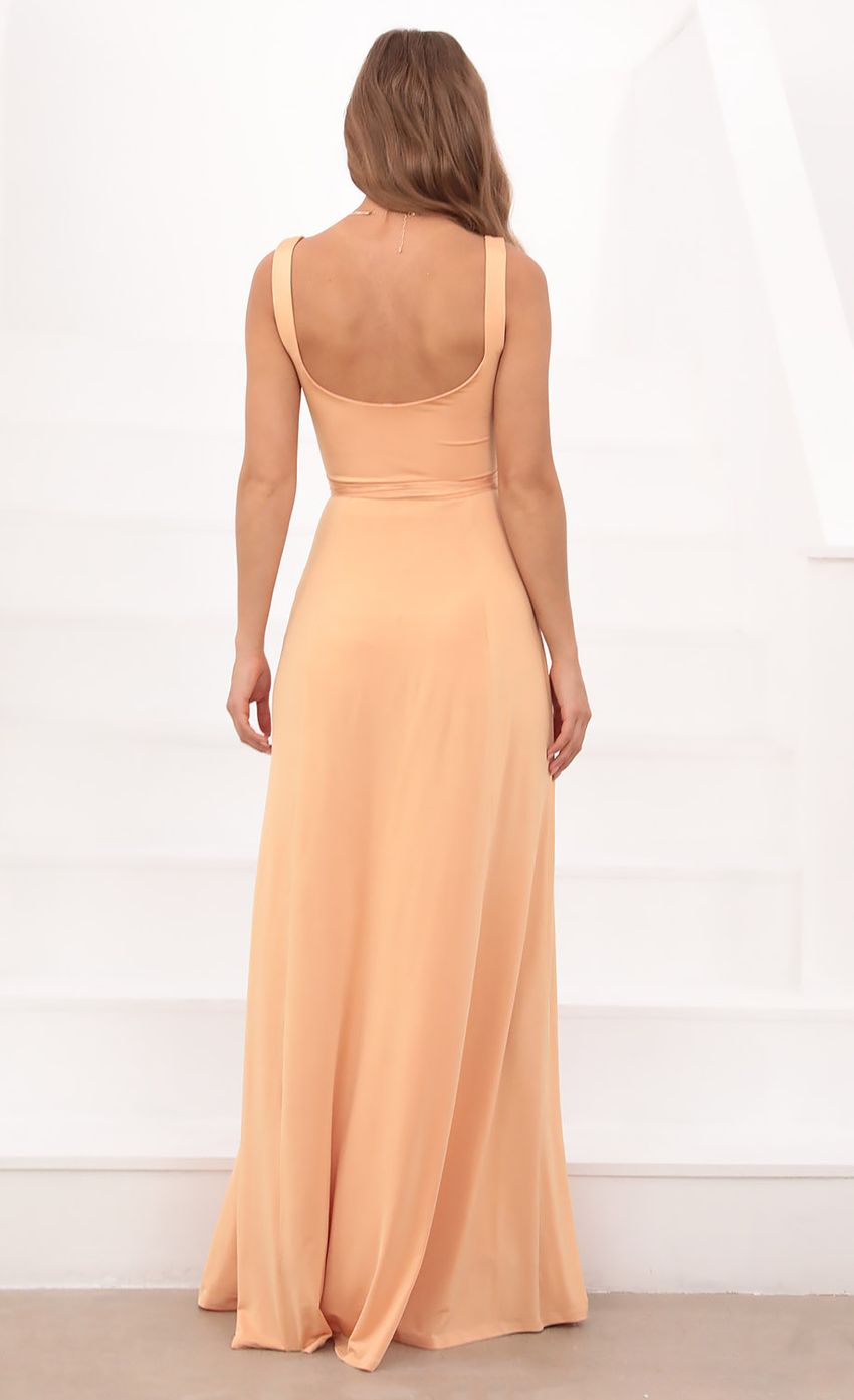 Picture Front Tie Maxi Dress in Tangerine. Source: https://media-img.lucyinthesky.com/data/Apr21_2/850xAUTO/1V9A3453.JPG