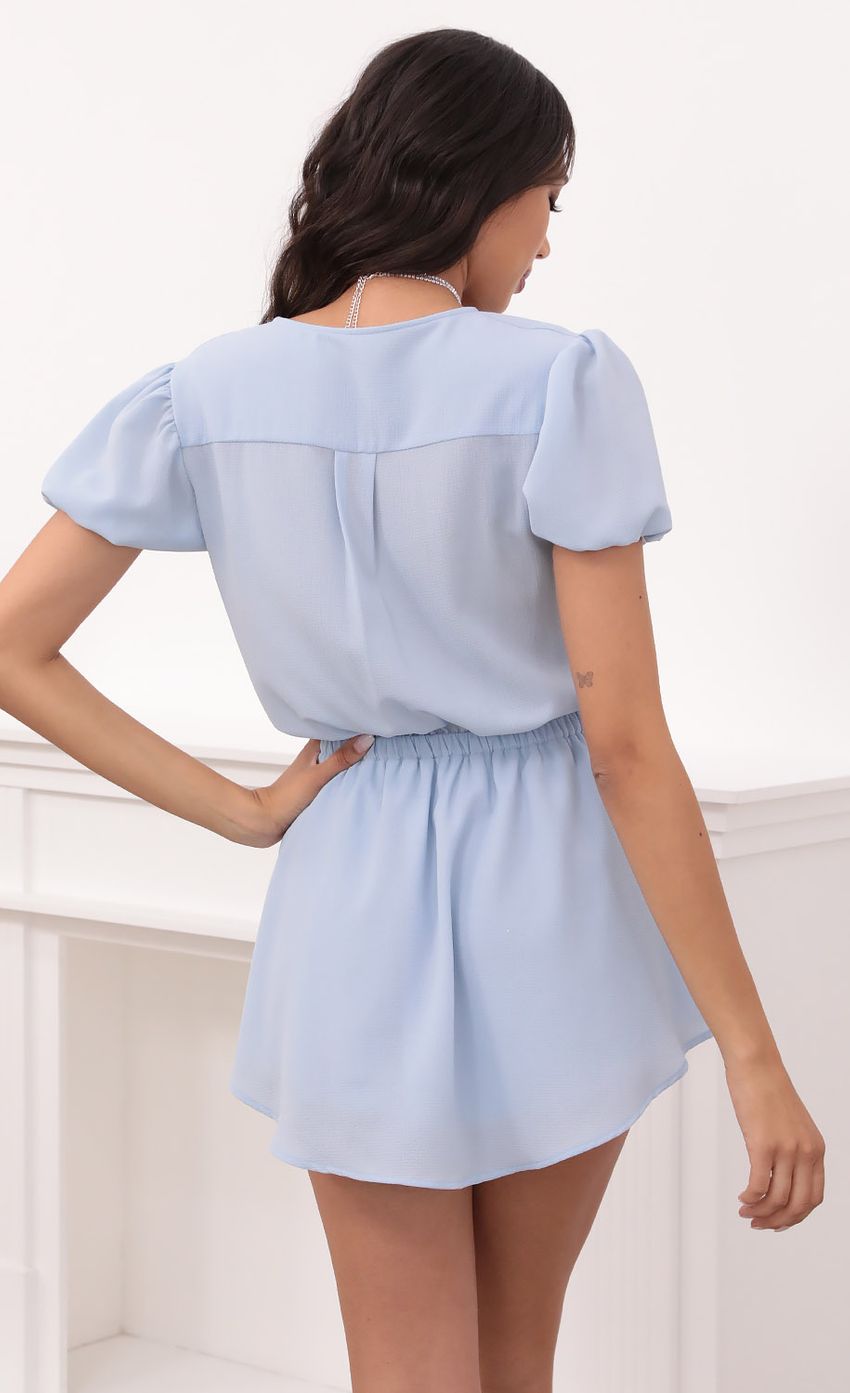 Picture Button Down Dress in Light Blue. Source: https://media-img.lucyinthesky.com/data/Apr21_2/850xAUTO/1V9A3541.JPG