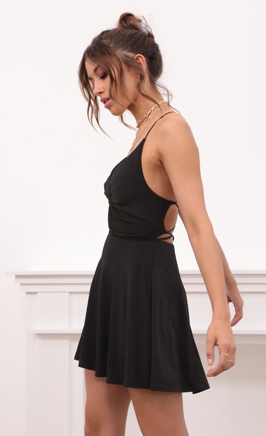 Picture Front Twist Dress in Black. Source: https://media-img.lucyinthesky.com/data/Apr21_2/850xAUTO/1V9A6647.JPG