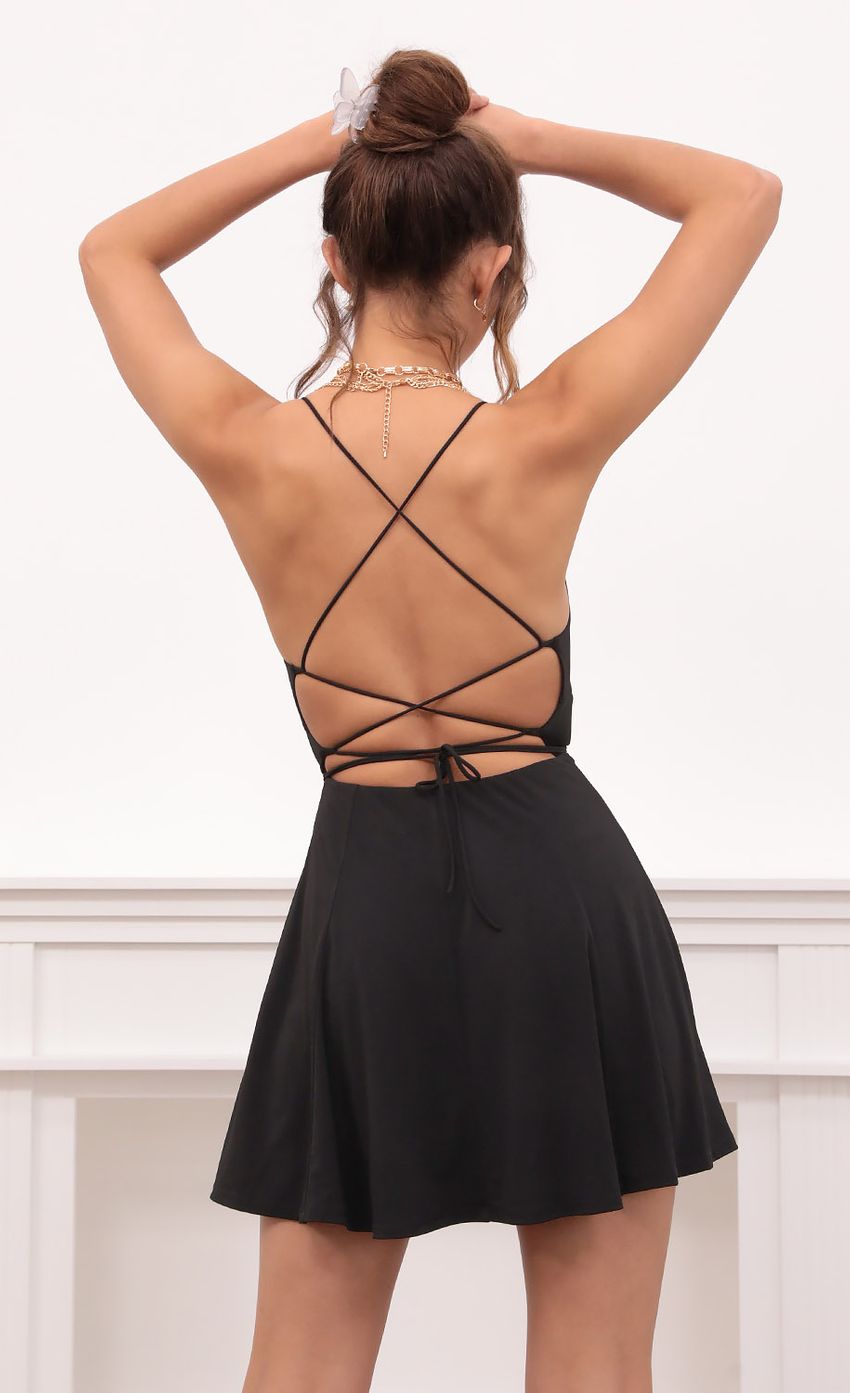 Picture Front Twist Dress in Black. Source: https://media-img.lucyinthesky.com/data/Apr21_2/850xAUTO/1V9A6680.JPG