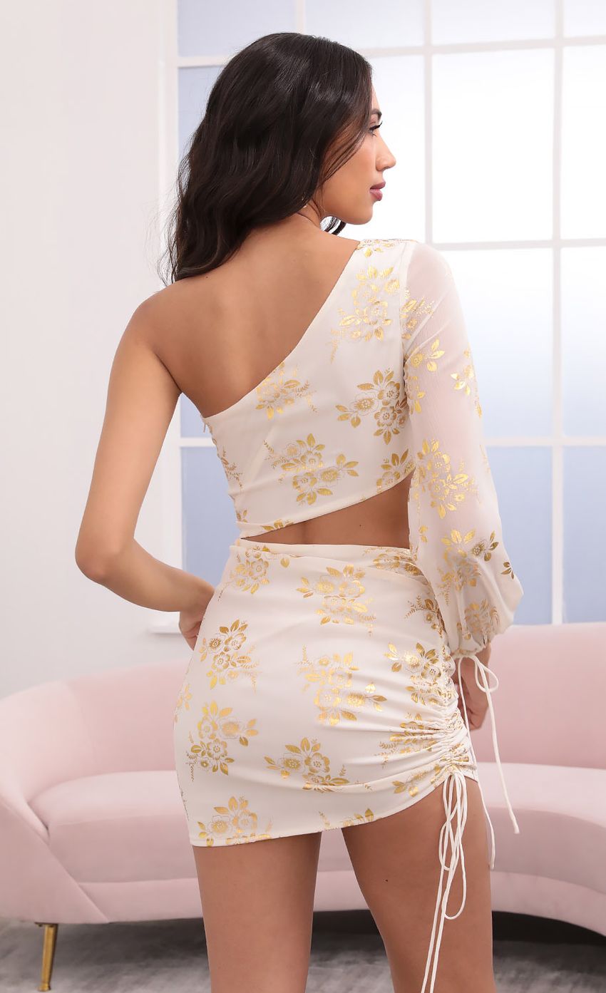 Picture One Shoulder Dress in Gold Floral. Source: https://media-img.lucyinthesky.com/data/Apr21_2/850xAUTO/1V9A6875.JPG