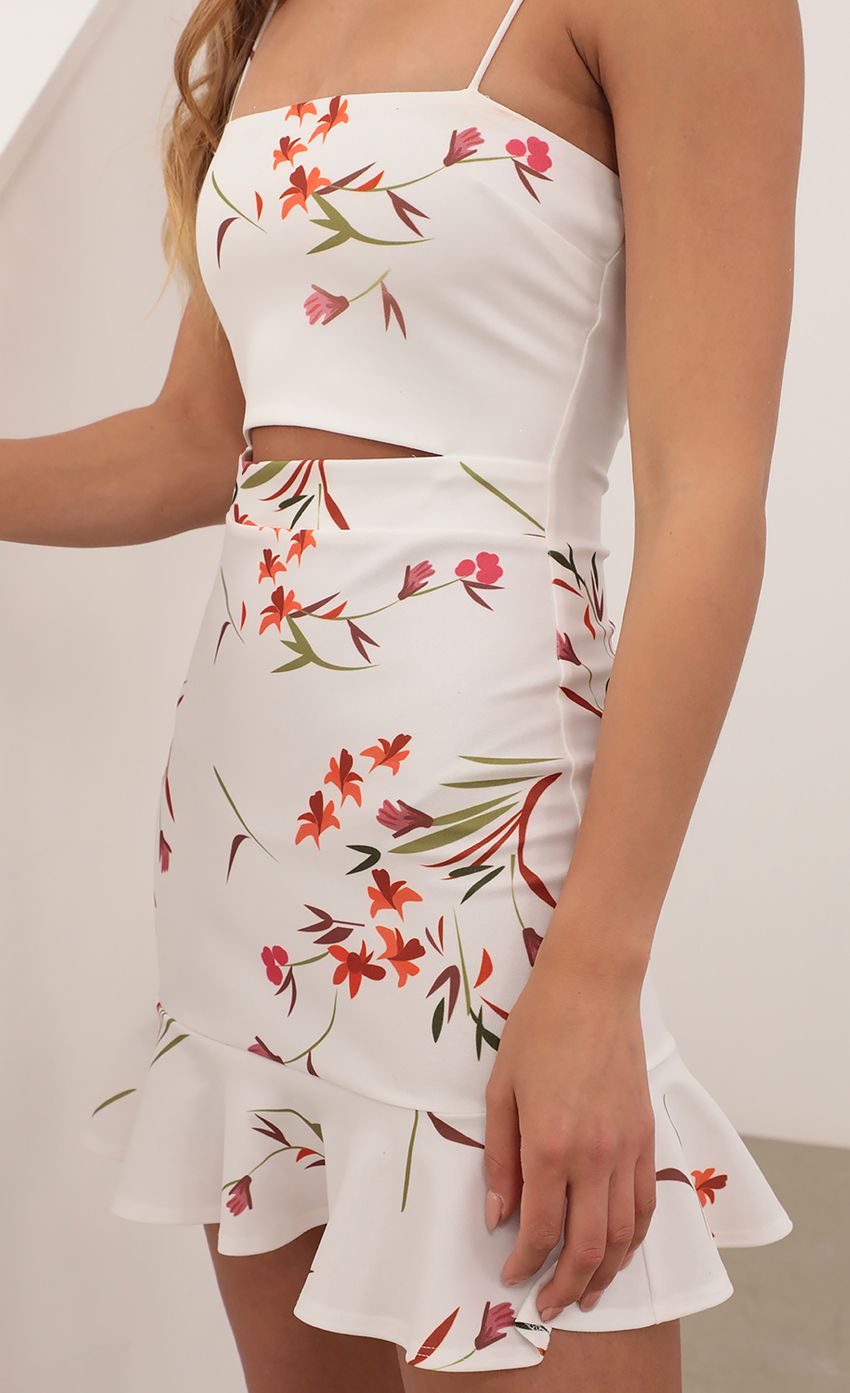 Picture Cutout Ruffle Dress in Tropical Flowers. Source: https://media-img.lucyinthesky.com/data/Apr21_2/850xAUTO/AT2A1100.JPG