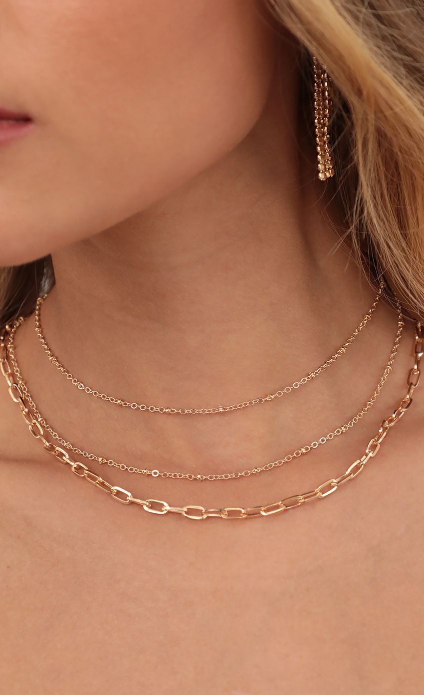 Picture Triple Square Link Chain and discs Necklace Set in Gold. Source: https://media-img.lucyinthesky.com/data/Apr21_2/850xAUTO/AT2A1877.JPG