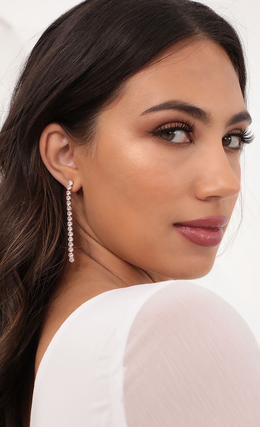 Picture Tennis Drop Earrings in Gold. Source: https://media-img.lucyinthesky.com/data/Apr21_2/850xAUTO/AT2A46881.JPG