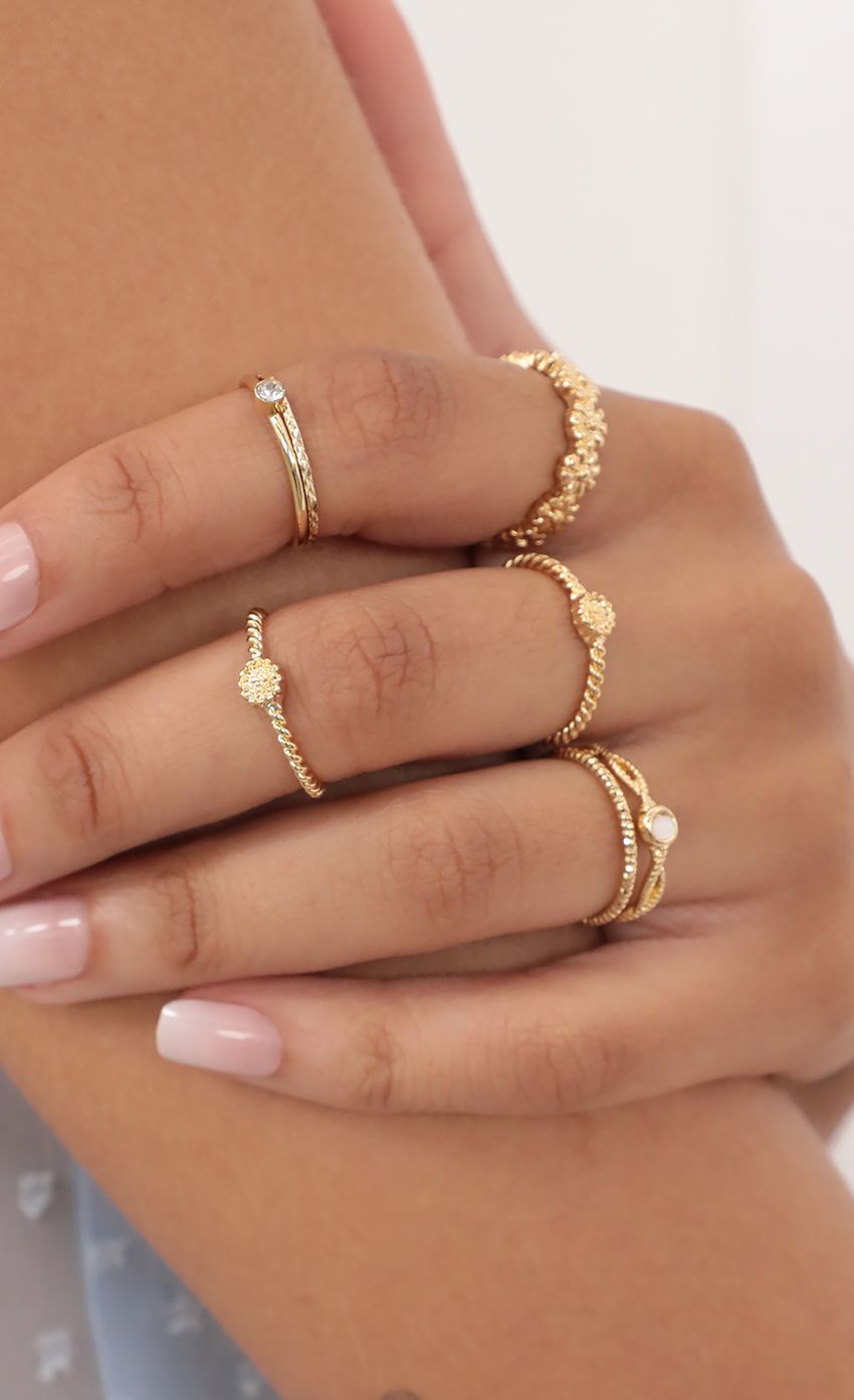 Picture Daisy Gold Ring Set. Source: https://media-img.lucyinthesky.com/data/Apr21_2/850xAUTO/AT2A4856.JPG