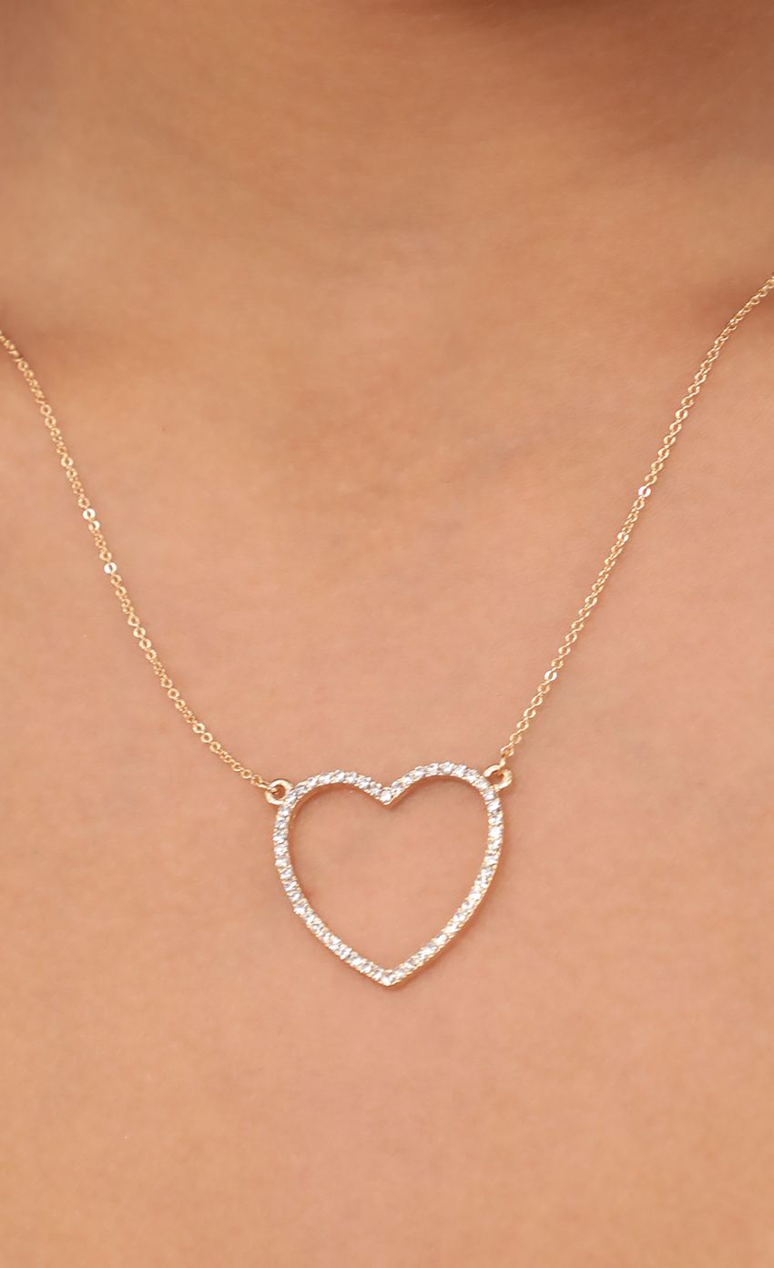 Picture Embellished Open Heart Necklace. Source: https://media-img.lucyinthesky.com/data/Apr21_2/850xAUTO/AT2A6672.JPG