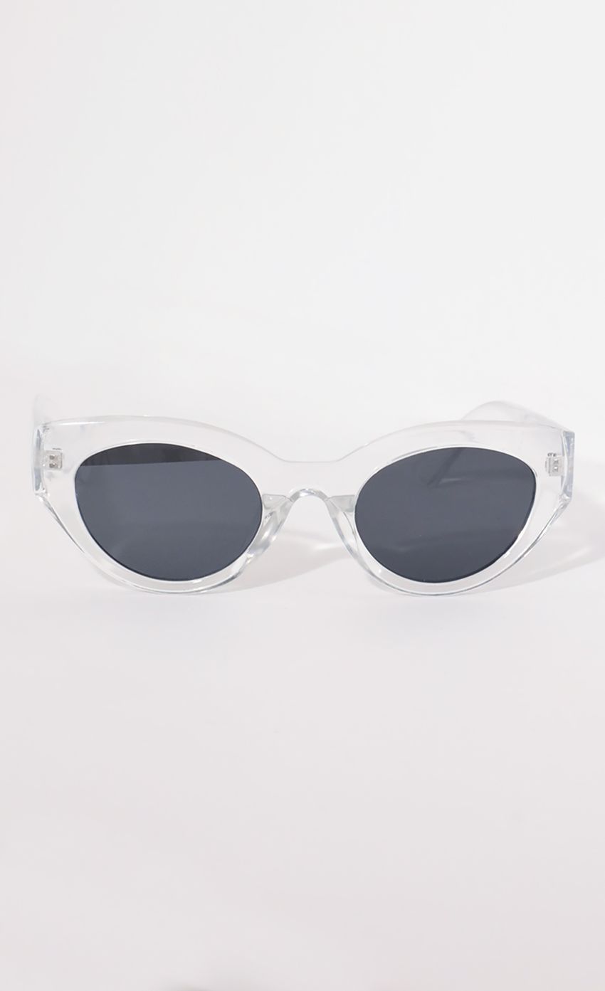 Picture Jade Cateye Sunglasses in Clear. Source: https://media-img.lucyinthesky.com/data/Apr21_2/850xAUTO/AT2A9101.JPG