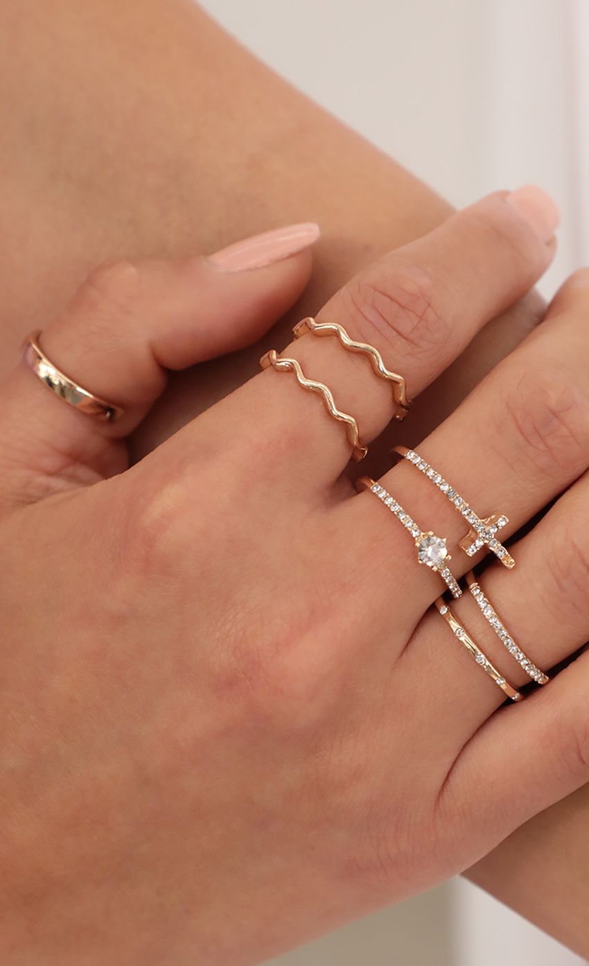 Picture Pave Cross Ring Set in Gold. Source: https://media-img.lucyinthesky.com/data/Apr21_2/850xAUTO/AT2A9402.JPG