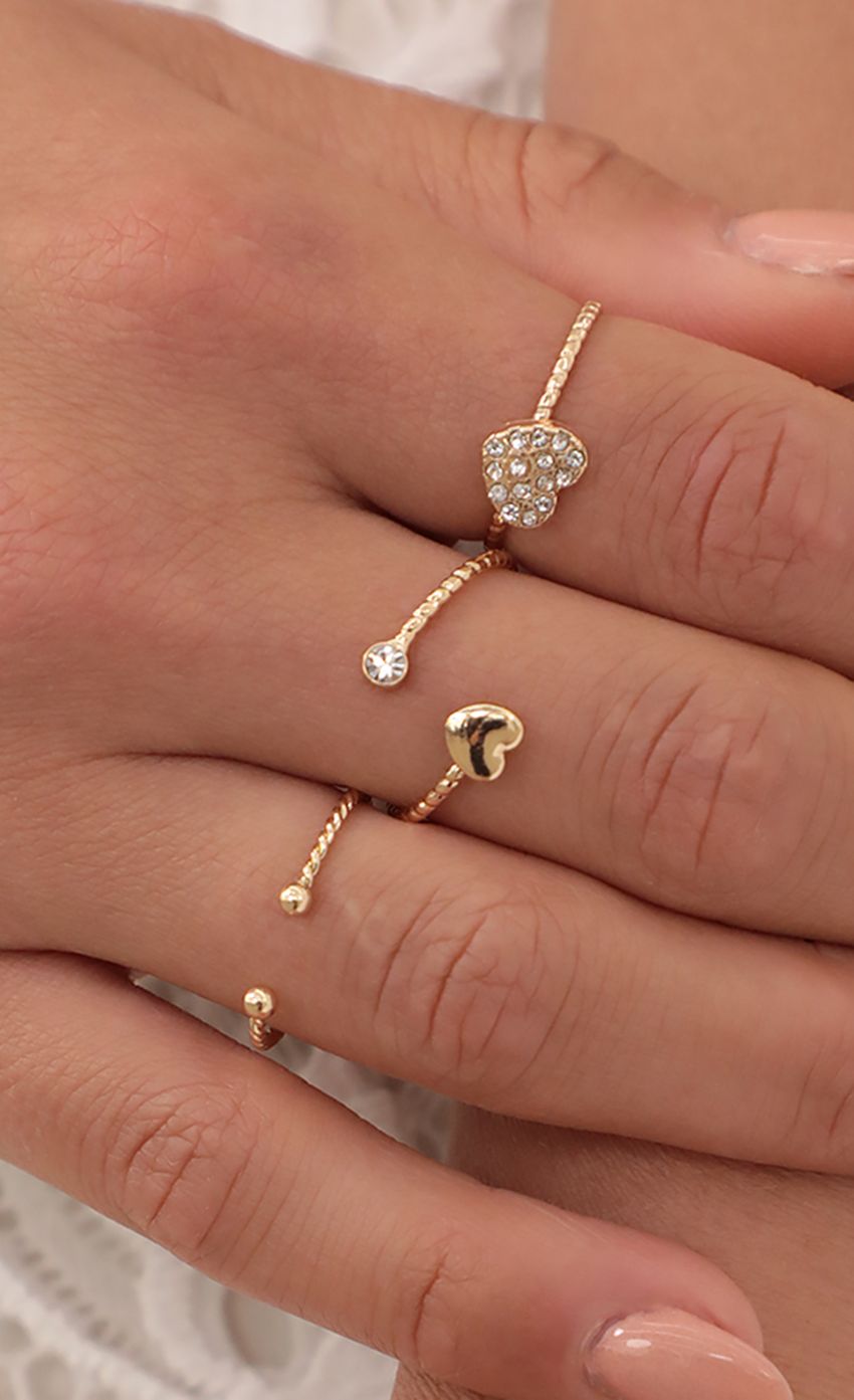 Picture Gold-Tone Heart Ring Set. Source: https://media-img.lucyinthesky.com/data/Apr21_2/850xAUTO/AT2A9844_CROPPED_IN.JPG