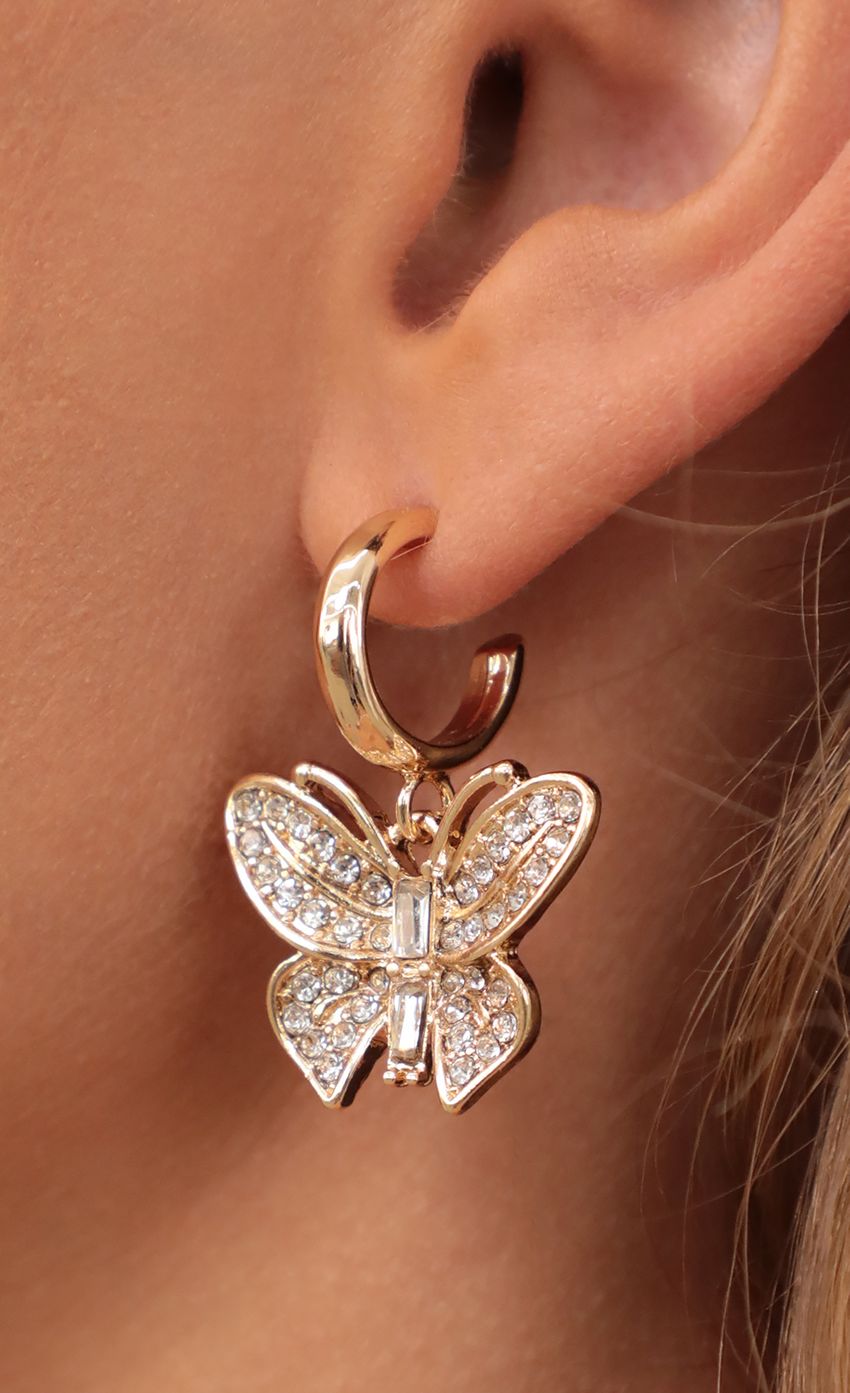 Picture Bold Butterfly Pave Hoops. Source: https://media-img.lucyinthesky.com/data/Apr21_2/850xAUTO/AT2A9902_CROPPED_IN.JPG