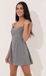 Picture A-line dress in Black and White Checkered. Source: https://media-img.lucyinthesky.com/data/Apr22_1/150xAUTO/1V9A5758.JPG