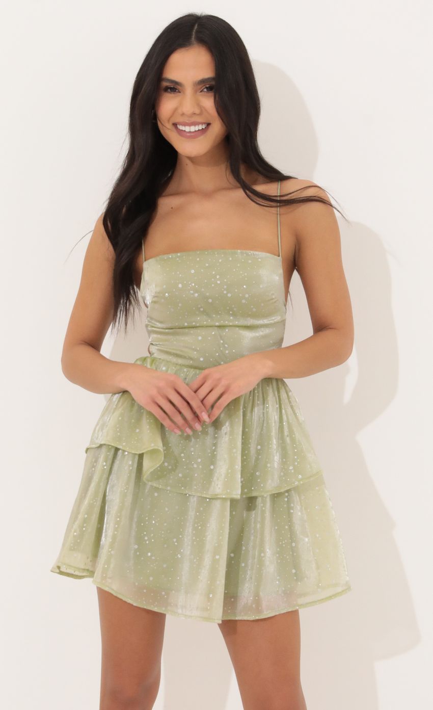 Picture Lace Up Dress in Green Glitter. Source: https://media-img.lucyinthesky.com/data/Apr22_1/850xAUTO/1V9A1954.JPG