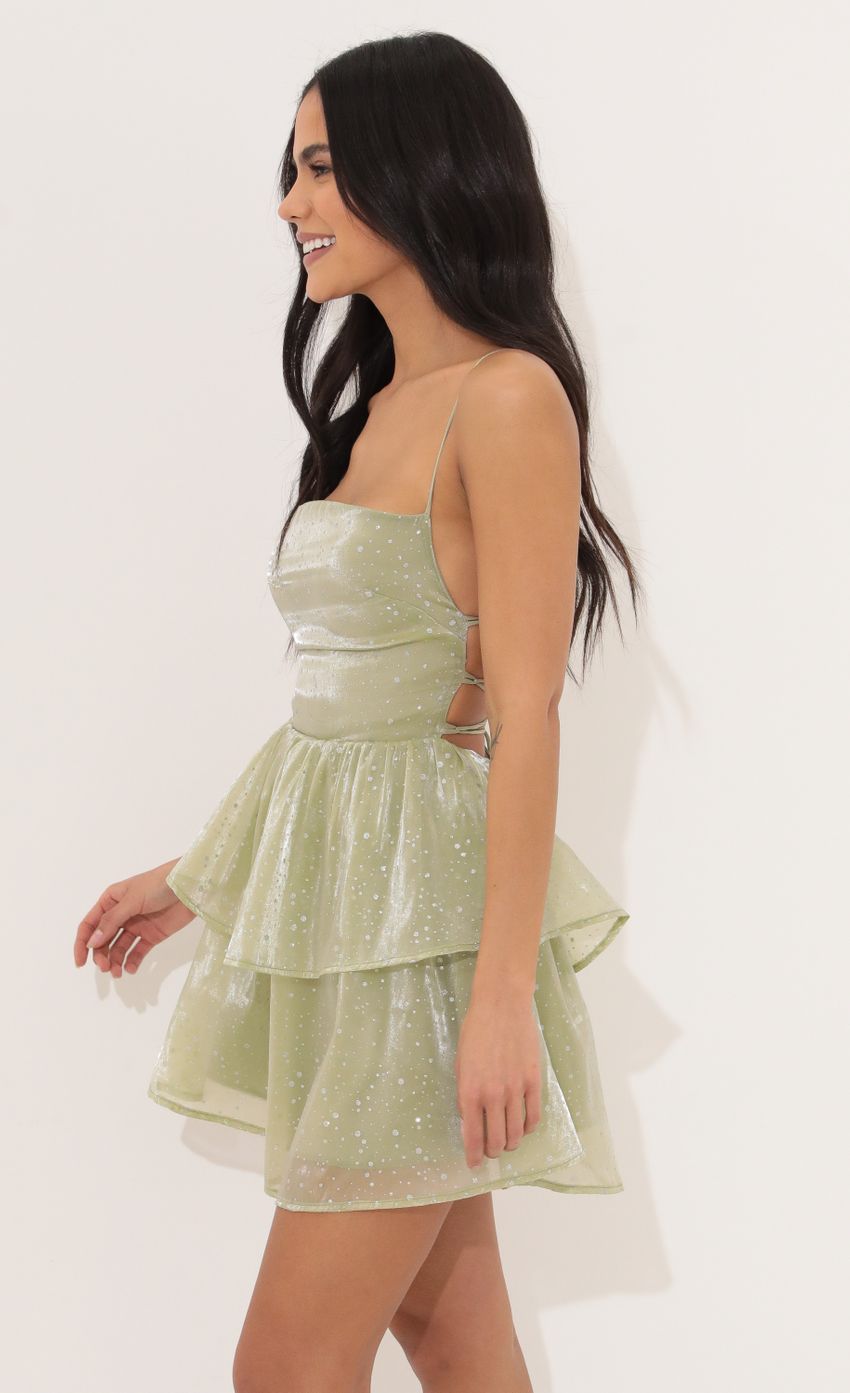 Picture Lace Up Dress in Green Glitter. Source: https://media-img.lucyinthesky.com/data/Apr22_1/850xAUTO/1V9A2029.JPG