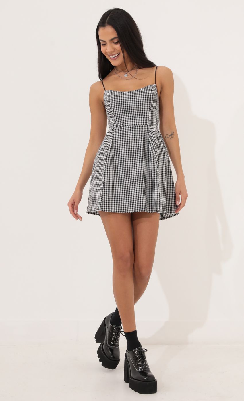 Picture A-line dress in Black and White Checkered. Source: https://media-img.lucyinthesky.com/data/Apr22_1/850xAUTO/1V9A5657.JPG