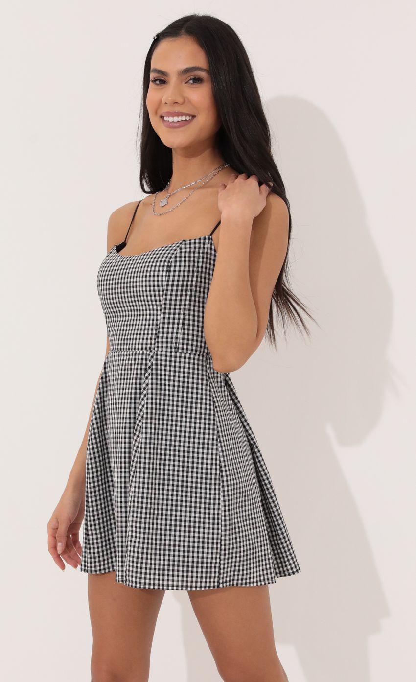 Picture A-line dress in Black and White Checkered. Source: https://media-img.lucyinthesky.com/data/Apr22_1/850xAUTO/1V9A5758.JPG