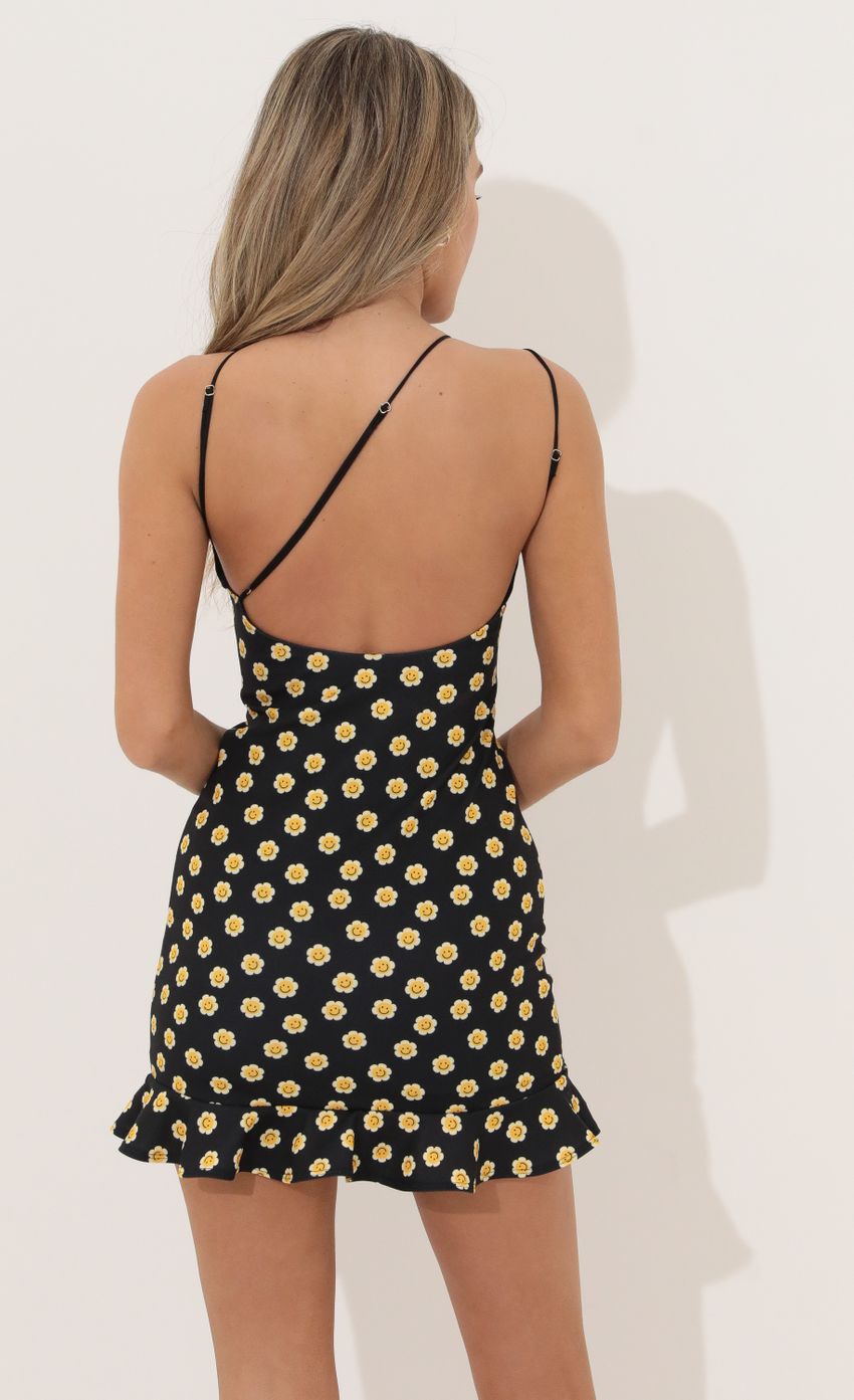 Picture Shoulder Ruffle Dress in Black Floral. Source: https://media-img.lucyinthesky.com/data/Apr22_1/850xAUTO/1V9A9408.JPG