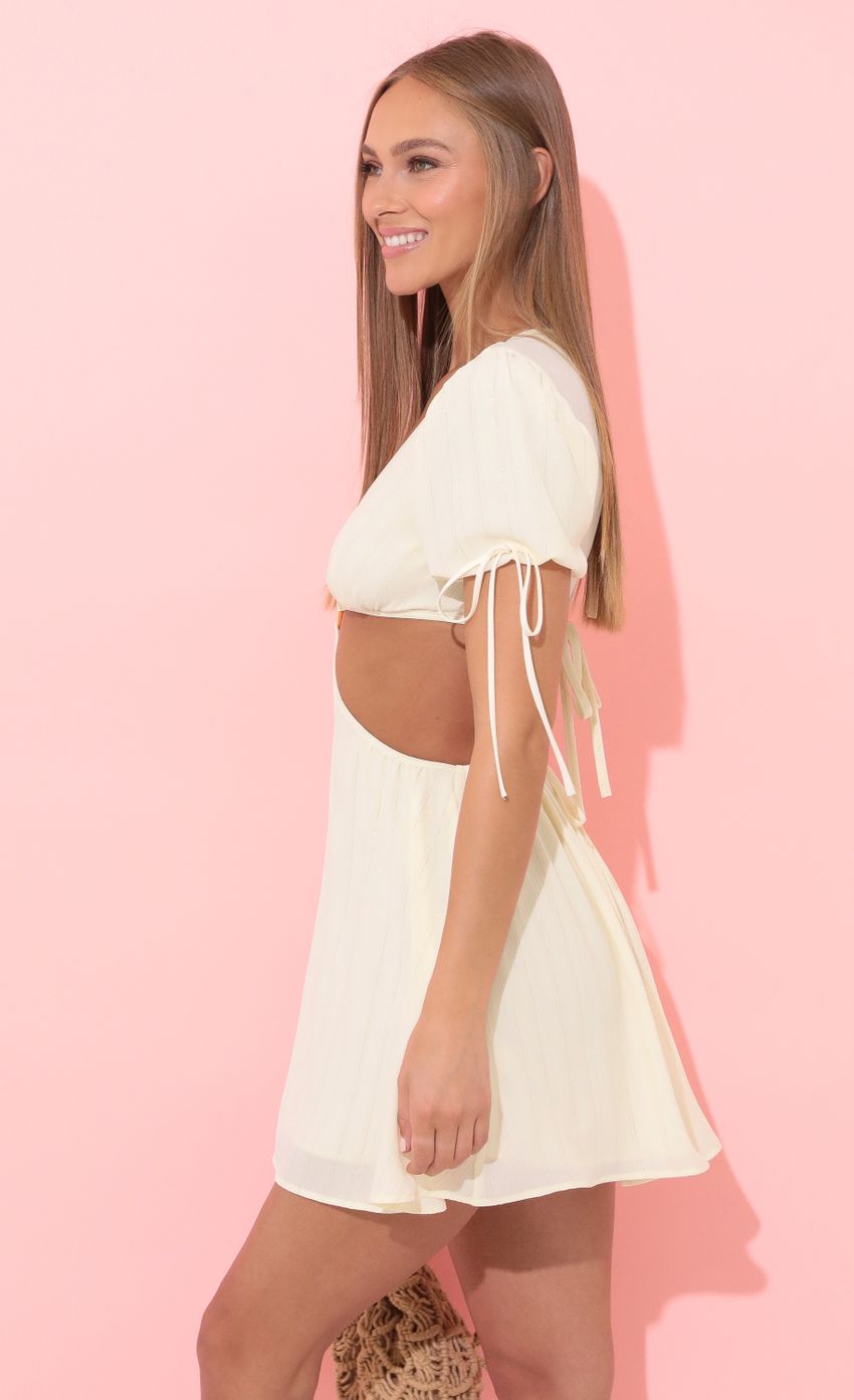 Picture Cutout Dress in Ivory. Source: https://media-img.lucyinthesky.com/data/Apr22_2/850xAUTO/1V9A1251.JPG